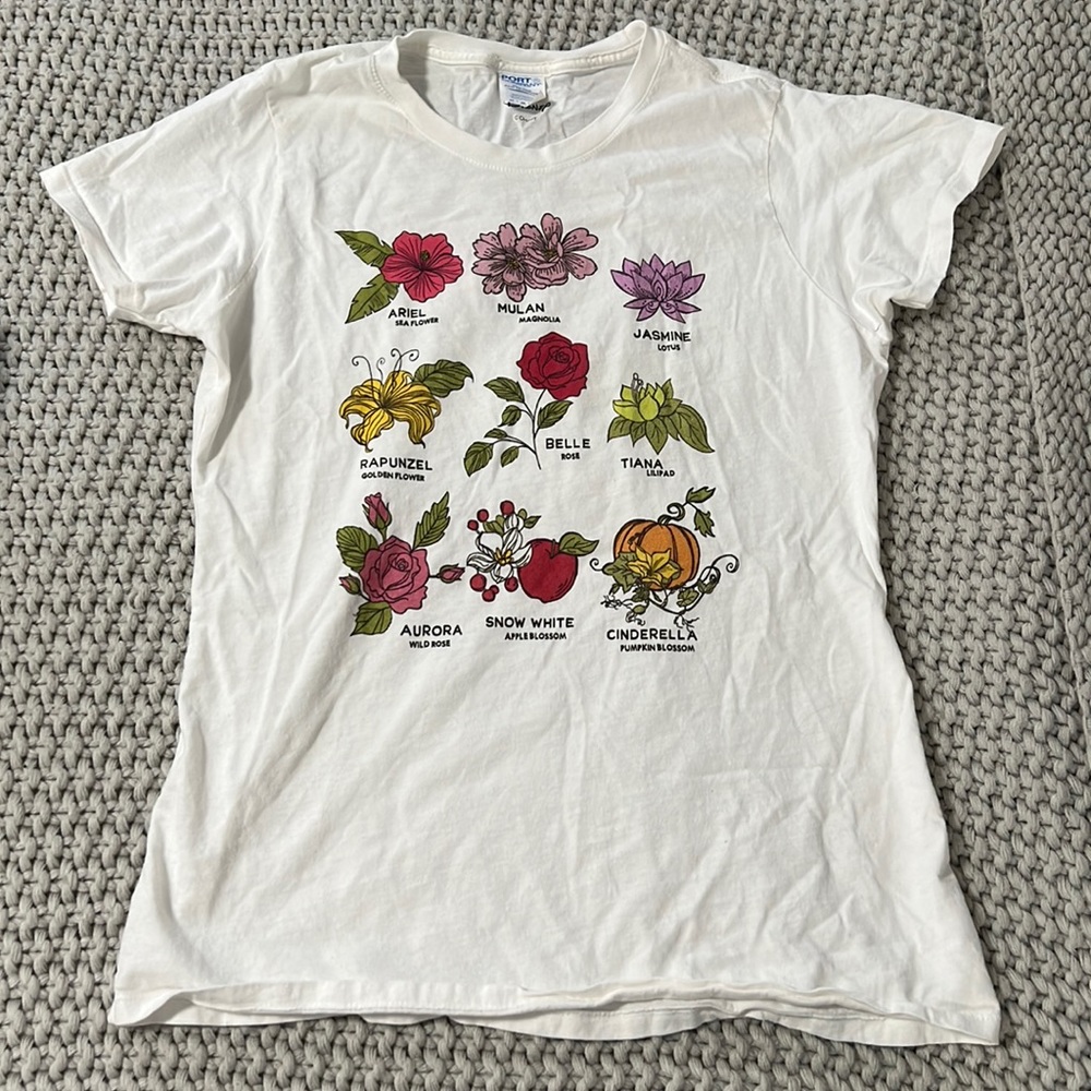 Disney Tee with flowers that represent the princesses! Only worn once at Disney.